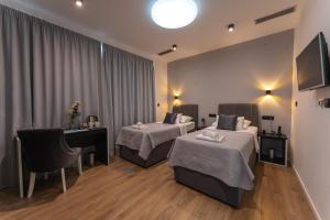 Sky & Sun Luxury Rooms with private parking in the garage