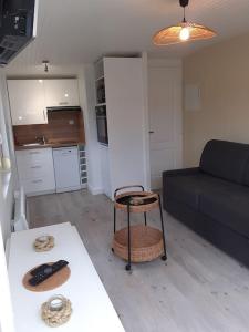 Appartements Studio Canape convertible 2 pers avec jardin et parking clos : photos des chambres