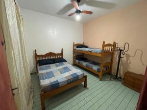 Casa Guilhermina com Piscina e Churrasqueira