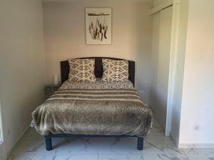 Appartements Studio climatise avec piscine et jardin : photos des chambres