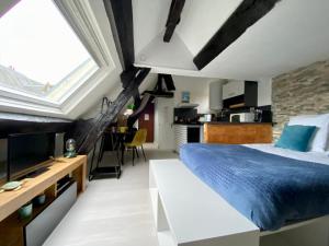 Appartements Mon Saint-Martin - APPART’HOTEL - Coeur de Bayeux : photos des chambres