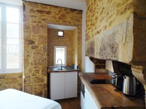 Les Appartements de Bacchus SARLAT-LA-CANEDA : photos des chambres