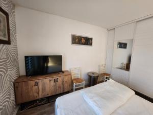 Appartements Le Baroque - Appt proche Centre et Memorial : photos des chambres