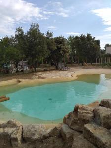Maisons de vacances le penequet : climatise, piscine lagon au milieu des chenes : photos des chambres
