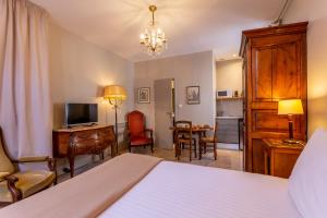 Appartements La Maison d'Aristide - Le confort du centre historique de Bourges : photos des chambres