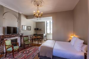 Appartements La Maison d'Aristide - Le confort du centre historique de Bourges : photos des chambres