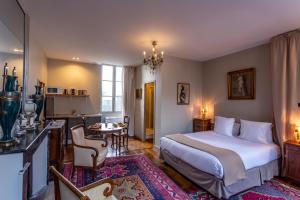 Appartements La Maison d'Aristide - Le confort du centre historique de Bourges : photos des chambres