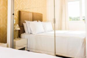 Apartamentos Residencial Conte 5 min da Rua Coberta by Achei Gramado