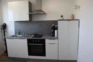 Appartements Le Belvedere proche A36 : photos des chambres