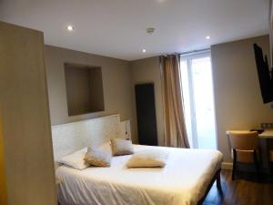 Hotels Logis Hotel Des Bains : photos des chambres