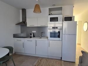 Appartements Corse, Appartement tout confort, acces direct plage : photos des chambres