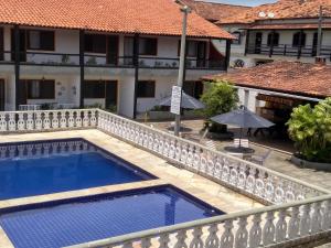 Refúgio Peró - Praia, piscina e churrasqueira