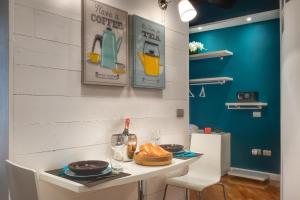 RHOMENJOY Open Space Colosseo