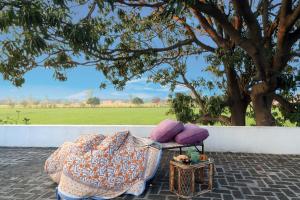 StayVista at The Hideout Farms with Lawn and private Pool