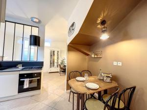 Appartements Studio LA RECYCLERIE - Maison 1911 - confort & prestige : photos des chambres