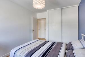 Appartements Le Baron T4 Spacieux et Lumineux : photos des chambres