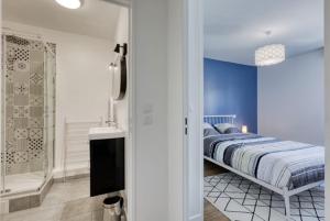 Appartements Le Baron T4 Spacieux et Lumineux : photos des chambres