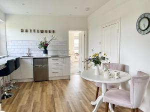 Welcome to Hazelwood, The Mount Somerton Apartment - modern and fully equipped, Private off-street parking, Near Glastonbury Tor, The spectacular Wells Cathedral, Stourhead, Sherborne Abbey, Millfield School, Clarks Village