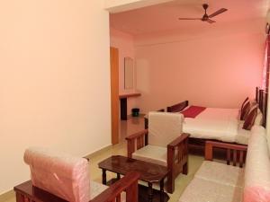 Hotel Abedrooms- Budget stay Thanjavur