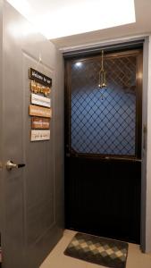 Lax Uno 2 bedroom home with Parking, Wi-Fi, NetFlix and Airconditioned Rooms and Shower Heater