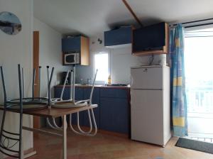 Campings Mobil Home Camping New Day : photos des chambres