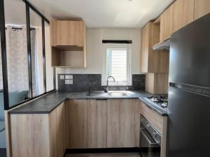 Campings MH 6-8p - tt equipe - WIFI inclus - camping 4e bord de lac : photos des chambres