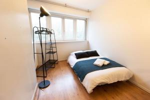 Appartements Le Jitaku- Magnifique Duplex - 15min Disneyland : photos des chambres