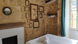 Les Appartements de Bacchus SARLAT-LA-CANEDA : photos des chambres