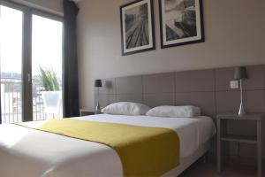 Appart'hotels Adonis Lyon Dock Ouest : photos des chambres