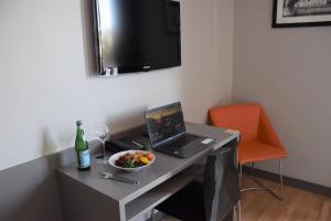 Appart'hotels Adonis Lyon Dock Ouest : photos des chambres