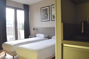 Appart'hotels Adonis Lyon Dock Ouest : photos des chambres