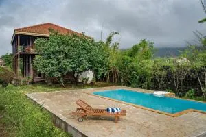 SaffronStays Boulevard LogHouse - a wooden chalet amidst nature - Kārli