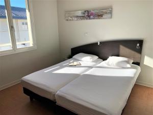 Appart'hotels ApartHotel Sainte-Marthe : photos des chambres