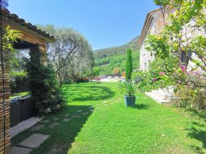 Appartements La Bergerie du Vallon d'Or : Appartement - Vue sur Jardin