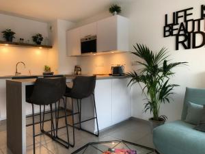 Appartements La Legende, 2 pieces avec parking prive gratuit pres du lac : photos des chambres