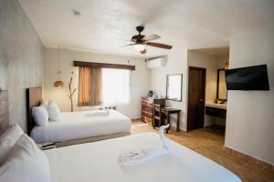 Petit Lafitte Beach Front Hotel & Bungalows