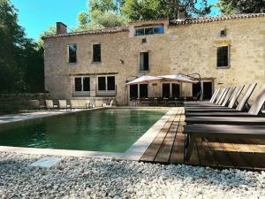 Villas Magnifique villa en pierre avec piscine : photos des chambres