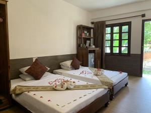 Phòng Suite Cao Cấp 2 Giường Đơn (Superior Suite Twin Room)