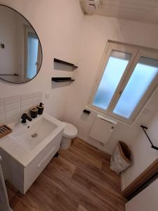 Appartements La petite grange - Unique, 5mn gare SNCF, 2 mn hyper centre, WIFI-Netflix : photos des chambres