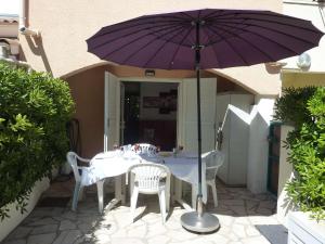 Appartement en Rez-de-Jardin Proche Plage avec Terrasse et Confort Moderne - FR-1-387-54