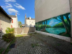 Maisons de vacances Maison de ville Orleans dans le Quartier Dunois avec parking privatif : photos des chambres