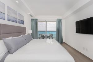 Brand New Contemporary 2 BD Oceanfront Condo at Encantame Towers Verano E302