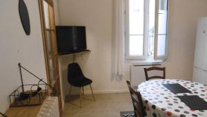 Appartements Appartement LE COURS : photos des chambres