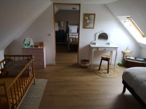 B&B / Chambres d'hotes LE DOMAINE DE COAT ROGAN L'espace familial : photos des chambres