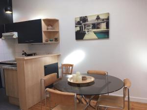 Appartements Hotel de Ville 3 et Parking : photos des chambres