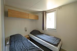 Campings CAMPING LES OURMES : photos des chambres