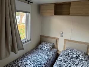 Campings Mobil Home Bleu ‘n’ Blue : photos des chambres