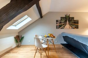 Appartements Le 12-GregIMMO-Appart'Hotel : photos des chambres