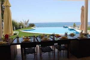 Breathtaking Villa with infinity pool over the sea