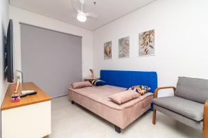 Apartamento Aconchegante e Elegante com Ar-Condicionado, Piscina, Garagem e Varanda Gourmet a 3 min da Praia